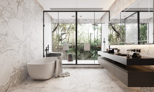 ein-badezimmer-mit-badewanne-und-einer-dusche-mit-einer-glastur